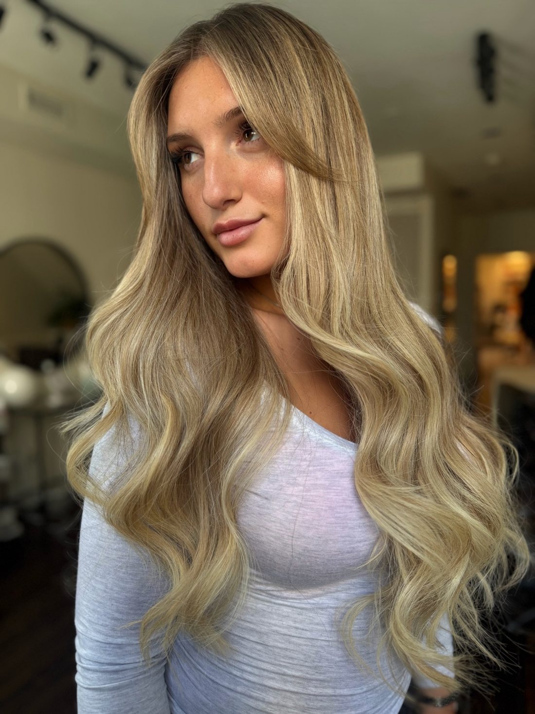 Long golden-blonde keratin bond extensions by Bond Girl Hair
